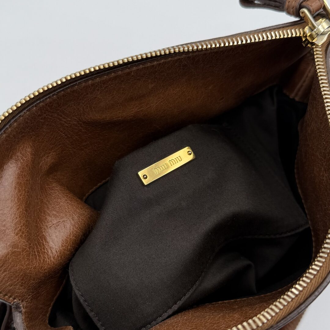 PreOwned Miu Miu Mini Vitello Lux Brown Leather Handbag