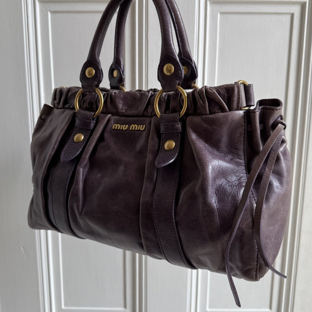 PreOwned Miu Miu Vitello Purple Leather Handbag
